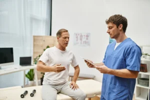 Clinician comparing TRT and BHRT options with a male patient